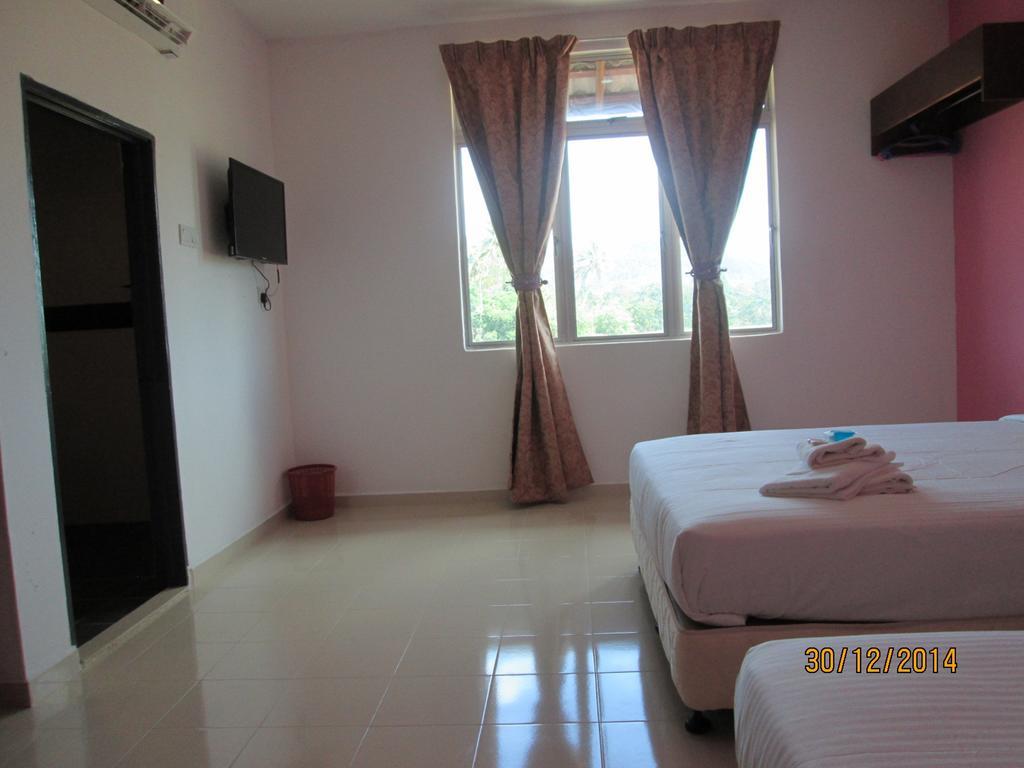 Oyo 275 Senyum Inn Pantai Cenang  Room photo